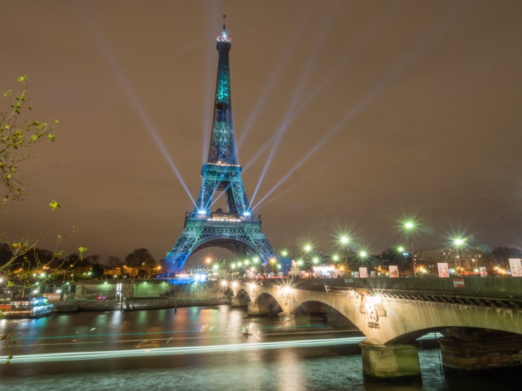 Eiffel Tower lit up in blue